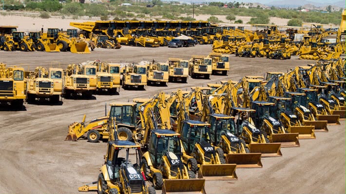 Mixed plant fleet staging area - excavators, loaders and dumpers ready for deployment across Gauteng sites - Abpy Group Pty Ltd