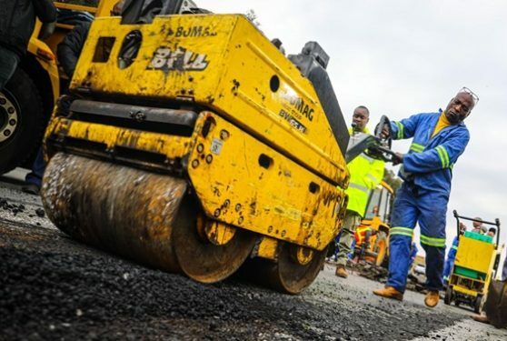 Vibratory roller compacting sub-base layers for R21 highway upgrade project in Gauteng - Abpy Group Pty Ltd